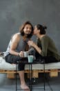 Young couple enjoying a cozy morning with coffee, creating intimate moments indoors.