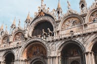 Stunning view of St. Mark's Basilica showcasing its Venetian Gothic architecture and intricate mosaics.