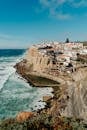 Explore the stunning coastal town of Azenhas do Mar with its dramatic cliffs and ocean views in Portugal.